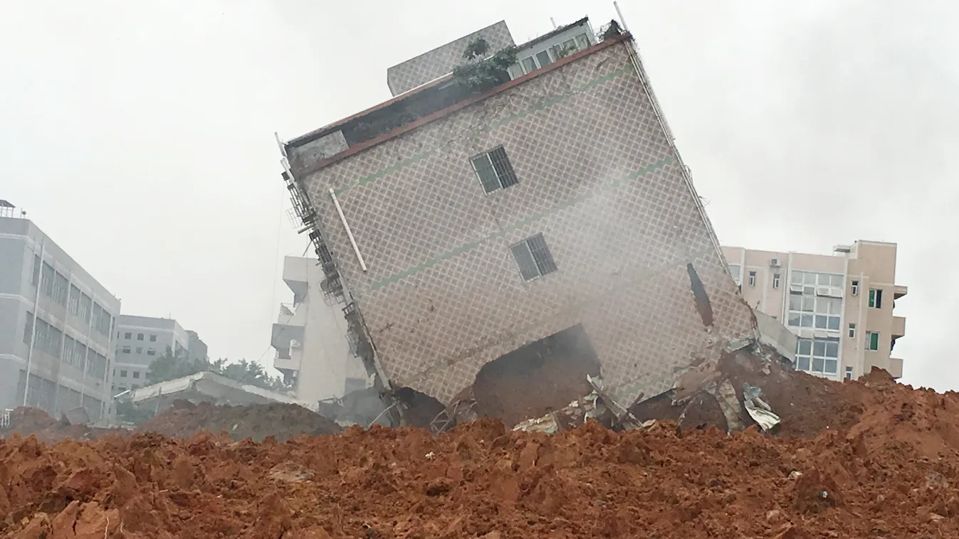 China Chinese Guangdong Shenzhen industrial park building landslide SQUARE FORMAT Buildings are collapsed and buried by the landslide at Liuxi Industrial Park in Hongao village, Shenzhen city, south China's Guangdong province, 20 December 2015.

A lands 