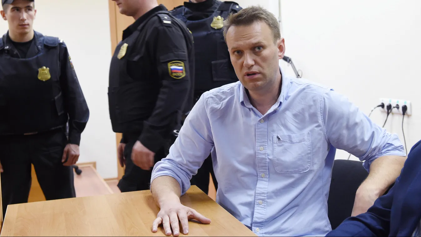 politics Horizontal Russian opposition leader Alexei Navalny speaks after a hearing in a court in Moscow, late on June 12, 2017. 
A Russian court sentenced Kremlin critic Alexei Navalny to 30 days behind bars.  / AFP PHOTO / VASILY MAXIMOV 