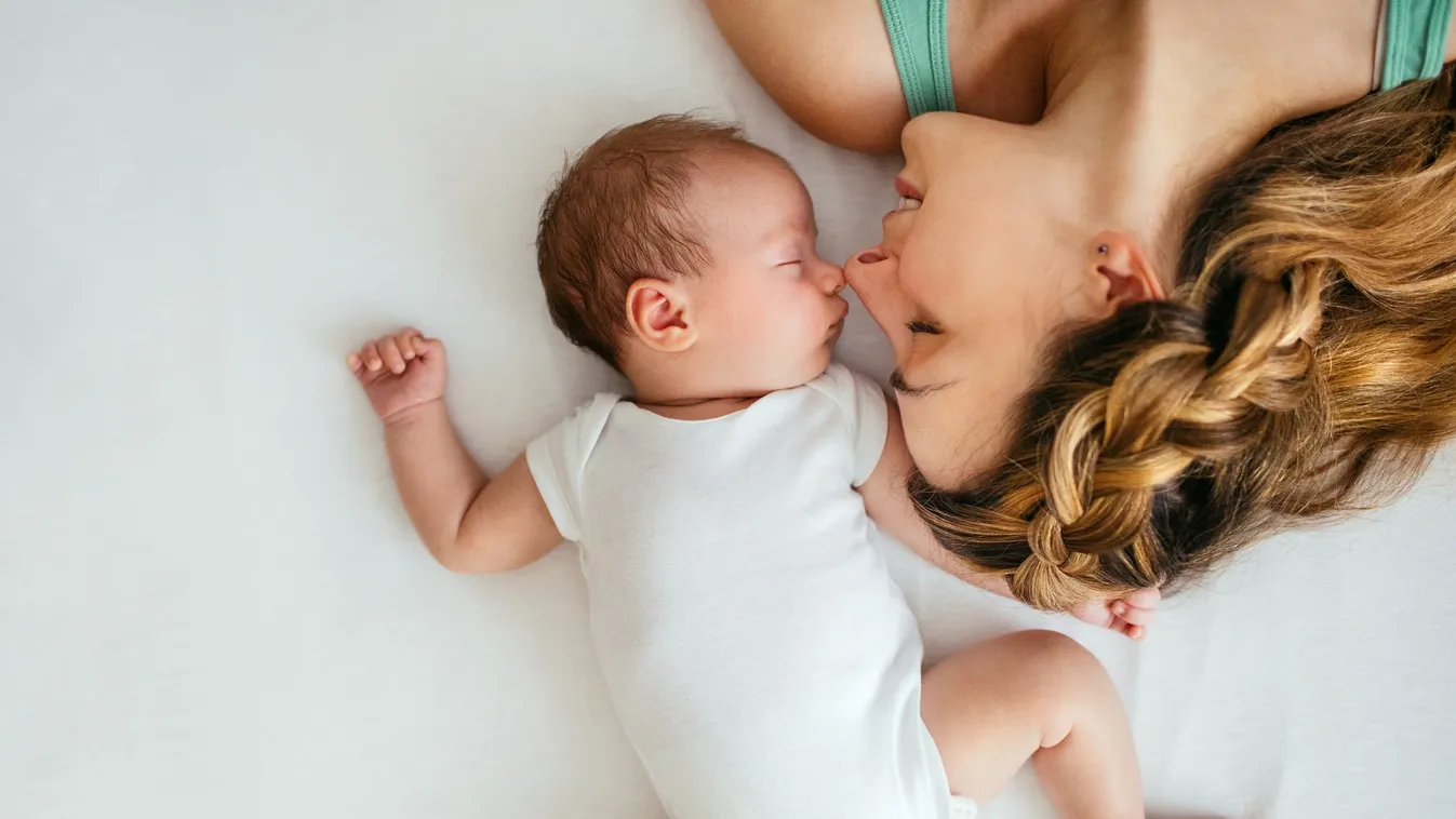 Motherhood Fashion Napping Photography Baby Girls Young Women Females Baby Boys Boys Copy Space Mother's Day Domestic Life Tank Top 1-2 Months Nursery - Bedroom 2-3 Months Color Image Baby Smiling Lying Down Sleeping Embracing Caucasian Ethnicity Bonding 