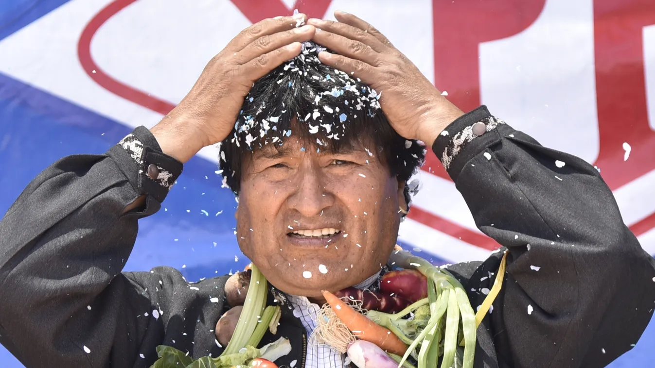 . Square Vertical Bolivia's President Evo Morales gestures during the inauguration of a regasification plant --which will allow about 2,000 home connections to the mains-- in Uyuni on November 9, 2016.   / AFP PHOTO / AIZAR RALDES 