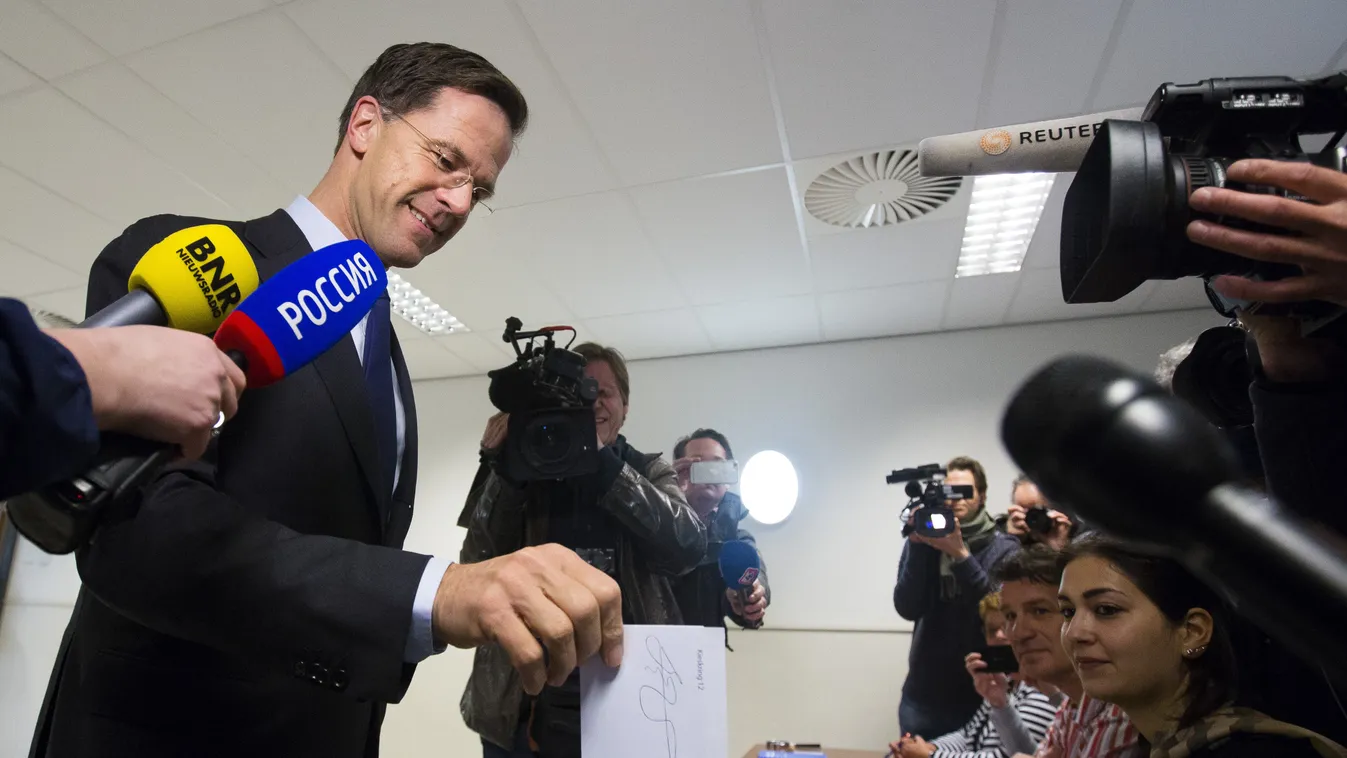 politics Horizontal Dutch Prime Minister Mark Rutte casts his vote in the referendum on the ratification of the association agreement between the EU and Ukraine held in the Netherlands, in The Hague, on April 6, 2016.
Dutch people began voting on April 6 