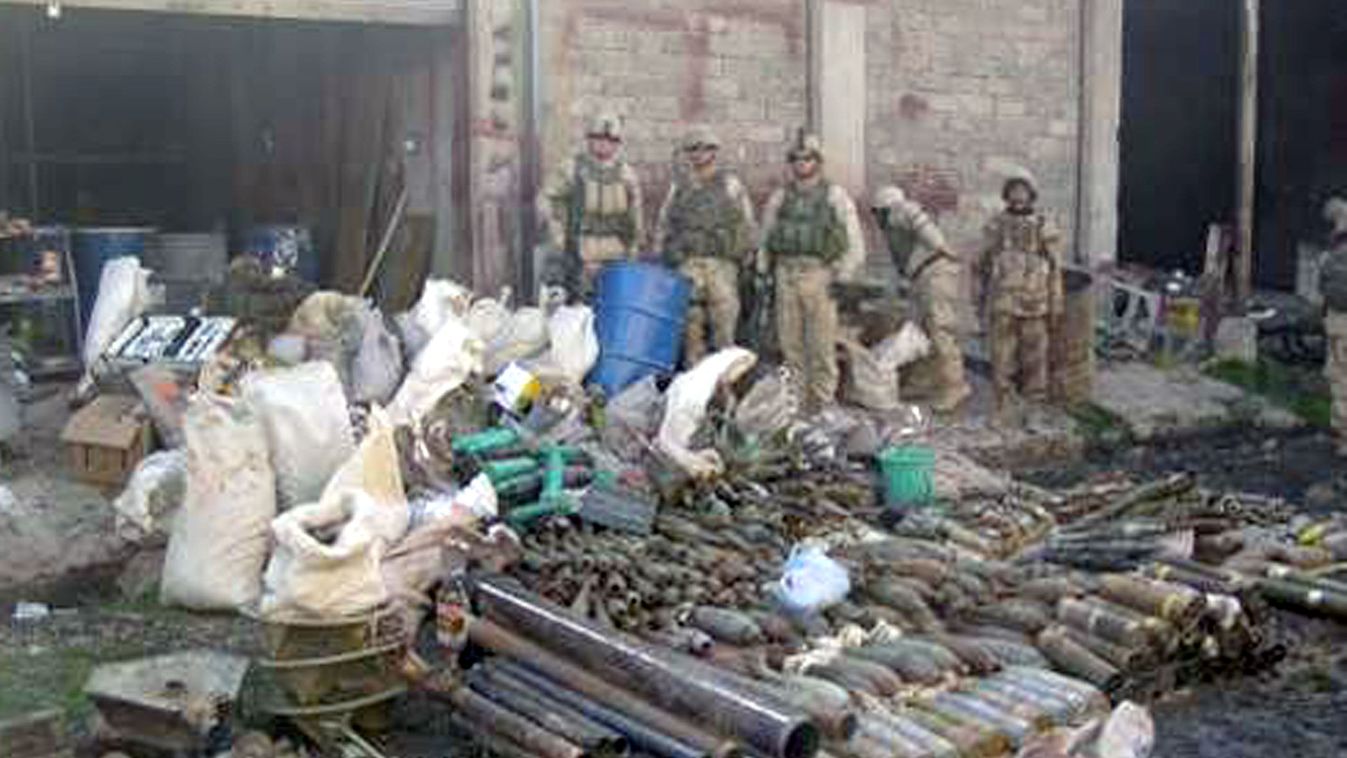 IRAQ-US-ARMS-CACHES Horizontal MIDDLE EAST IRAQ WAR AFTER THE WAR ARMS CACHE SOLDIER ARMED FORCES ARMAMENT 