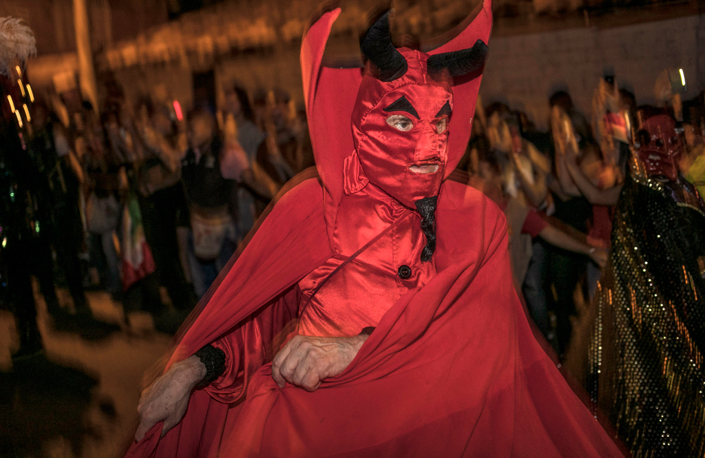 A reveller takes part in the Devils parade at the Devil's Carnival, in Riosucio, Caldas department, Colombia, on January 5, 2019. - The Devil's Carnival -which runs from January 4 to 9 and takes place every two years- has its origins in the 19th century w