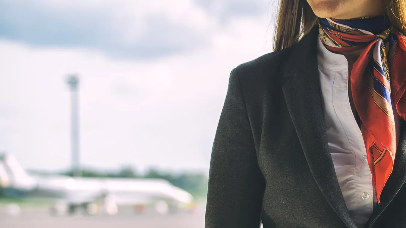 Stewardess on the airfield. Place for your text. Adult Air Air Stewardess Air Vehicle Airplane Airport Business Cabin Crew Clothing Commercial Airplane Confidence Day Exploration Passenger Service Space Transportation Voyager Women Stewardess on the airfi