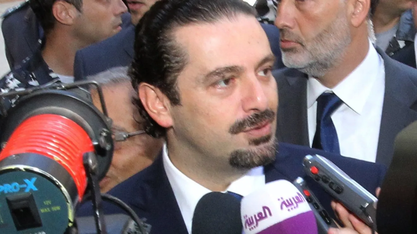 Former Lebanese premier Saad Hariri (C) speaks to the press outside governmental palace in Beirut on August 8, 2014 following his meeting with current Prime Minister Tammam Salam upon Hariri's return to Lebanon after three years in self-imposed exile. The