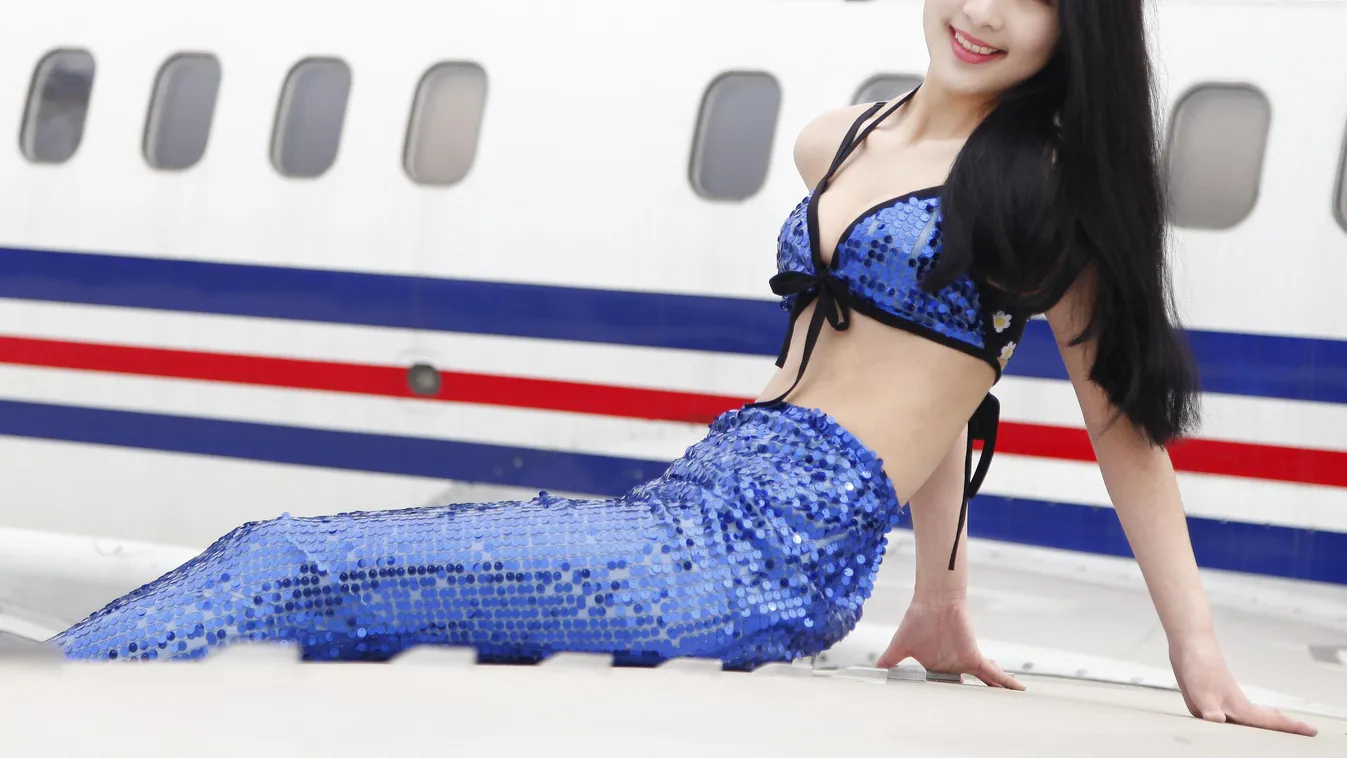 Sichuan university student dresses up as a mermaid to mark World Water Day China Chinese Sichuan Chengdu Mermaid student World Water Day SQUARE FORMAT 
