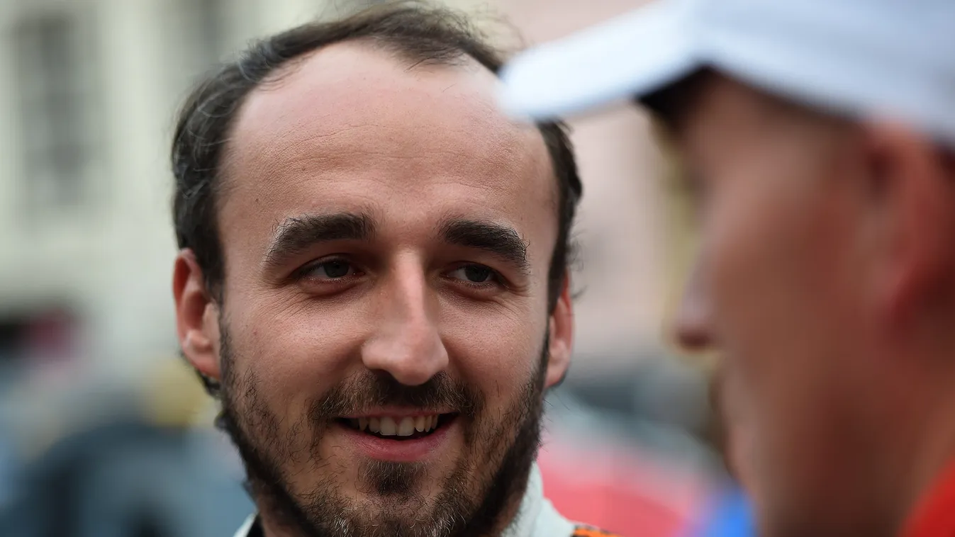 - Horizontal Robert Kubica of Poland is seen ahead of the Rally of Germany on August 20, 2015 in Trier, Germany.  AFP PHOTO / PATRIK STOLLARZ / AFP PHOTO / PATRIK STOLLARZ 