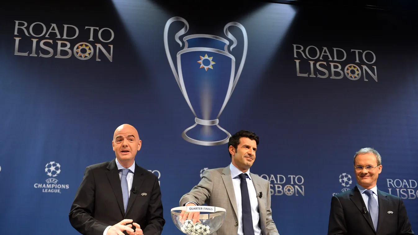 - (L-R) UEFA General Secretary Gianni Infantino, ambassador for the final in Lisbon, former Portugal international Luis Figo and UEFA director of competitions Giorgio Marchetti take part in the draw for the quarter-finals of the UEFA Champions league at t