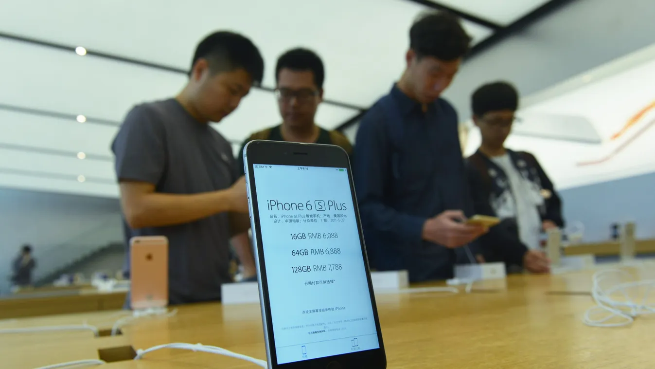 China Chinese Apple iPhone smartphone cellphone mobile cell phone SQUARE FORMAT --FILE--Chinese customers try out iPhone 6s and 6s Plus smartphones at an Apple Store in Hangzhou city, east China's Zhejiang province, 25 September 2015.

Apple Inc. is fig 