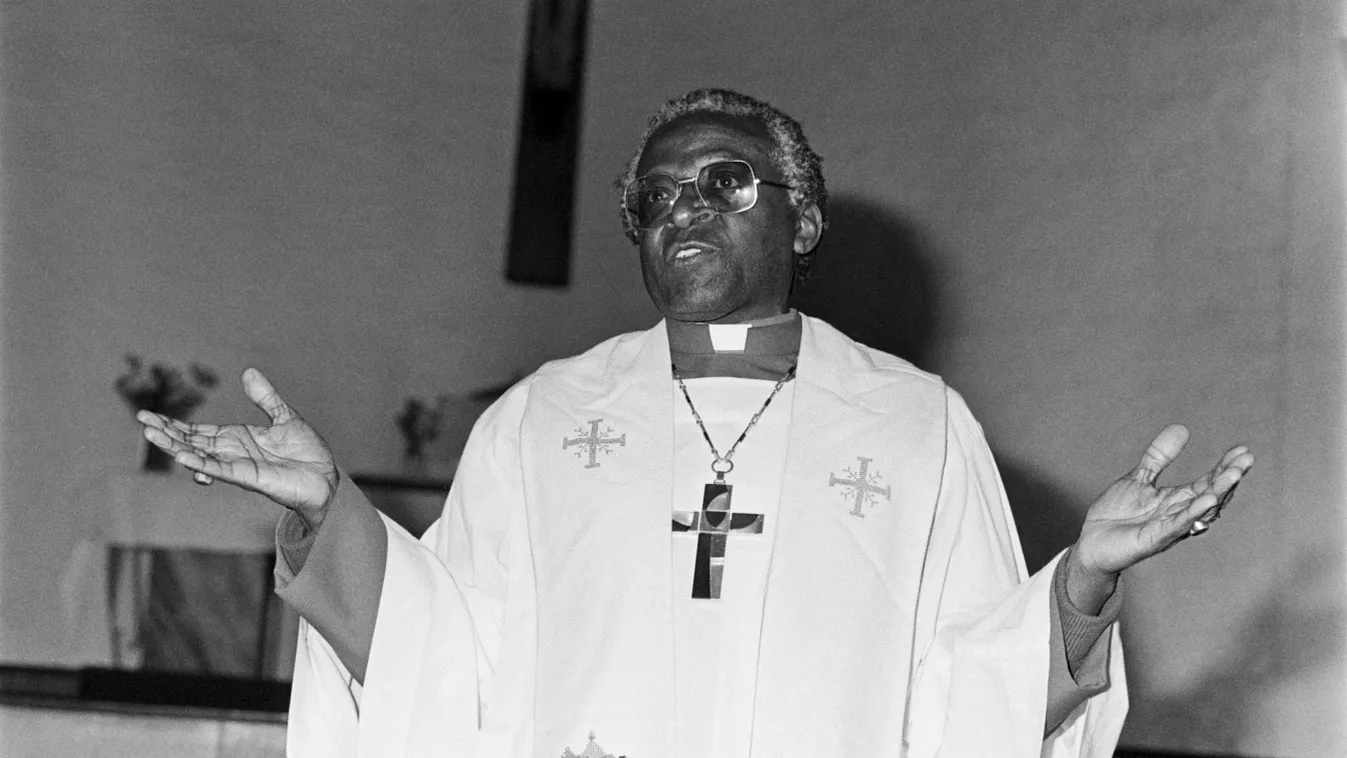 BIO-SOUTH-AFRICA-TUTU Horizontal BLACK AND WHITE PICTURE ARCHBISHOP ANGLICAN ANGLICAN RELIGION CHRISTIAN RELIGION CHURCH RELIGIOUS CEREMONY SPEAKING OPEN ARMS AFRICAN SPEECH HEADSHOT 