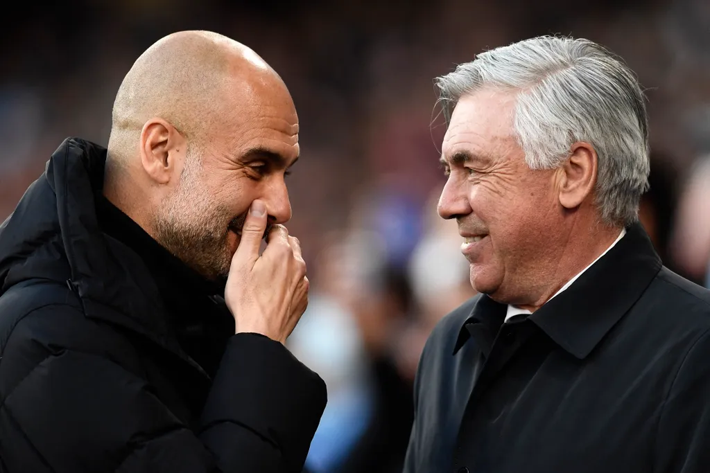 Manchester City v Real Madrid Semi Final Leg One - UEFA Champions League Manchester City Real Madrid Carlo Ancelotti Pep Guardiola Two people UEFA Champions League Semi Final Leg One match Pep Guardiola head coach Carlo Ancelotti head coach United Kingdom