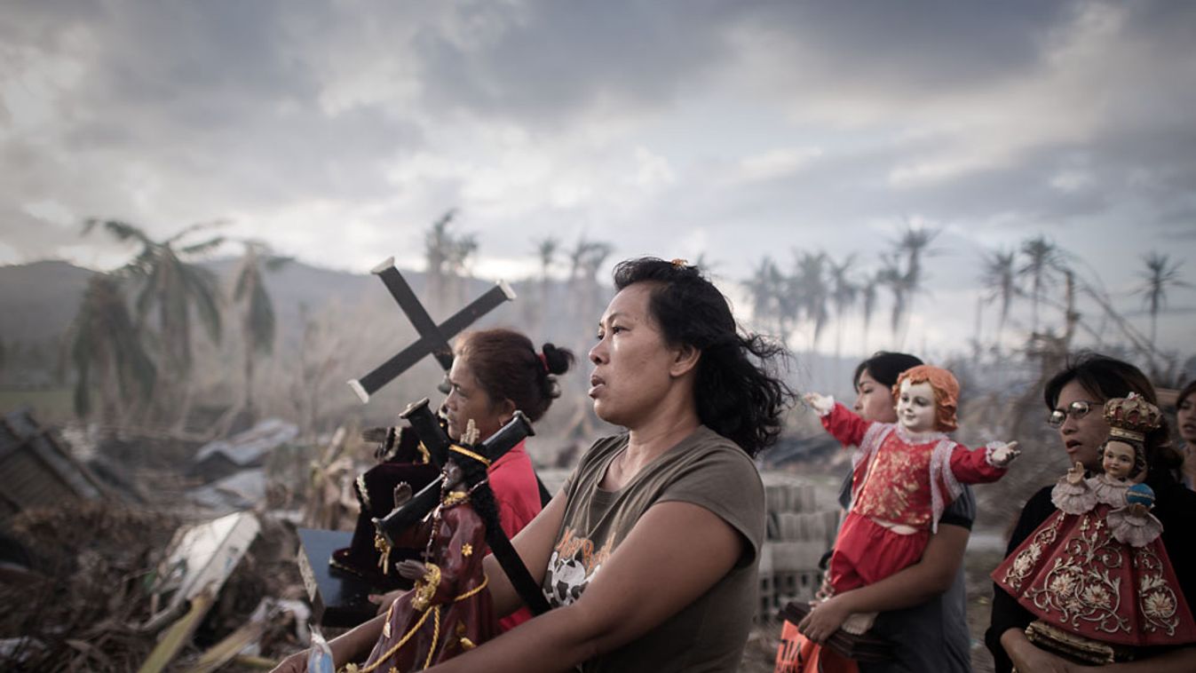 haiyan tájfun, fülöp-szigetek, túlélők egy vallási meneten Tolosában