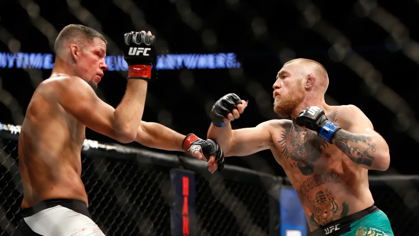 UFC 202: Diaz v McGregor 2 GettyImageRank3 People EVENT SPORT HORIZONTAL THREE QUARTER LENGTH Combat Sport USA Nevada Las Vegas Two People Photography MARTIAL ARTS Welterweight Ultimate Fighting Championship rematch Mixed Martial Arts Nate Diaz BATTLE Con