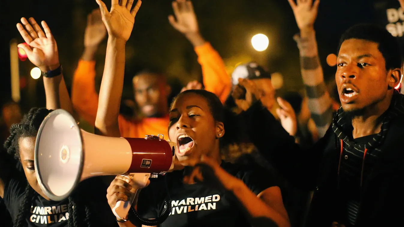 GettyImageRank2 Black RACE DEATH JUSTICE HORIZONTAL Protest African-American Ethnicity Police Force USA CRIME VIOLENCE MISSOURI St. Louis LAW Protestor Killing Responsibility Streets Vonderrit Myers ST LOUIS, MO - OCTOBER 09: Demonstrators march through t