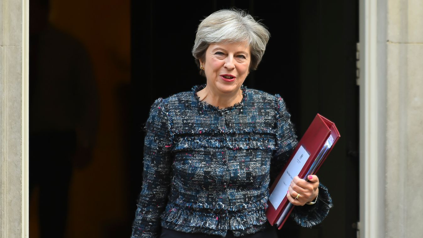 Theresa May leaves 10 Downing Street on her way to the Houses of Parliament 10 Downing Street Asking Houses Of Parliament London International Landmark Leaving London - England POLITICS Politics and Government PRIME MINISTER Talking Theresa May UK 