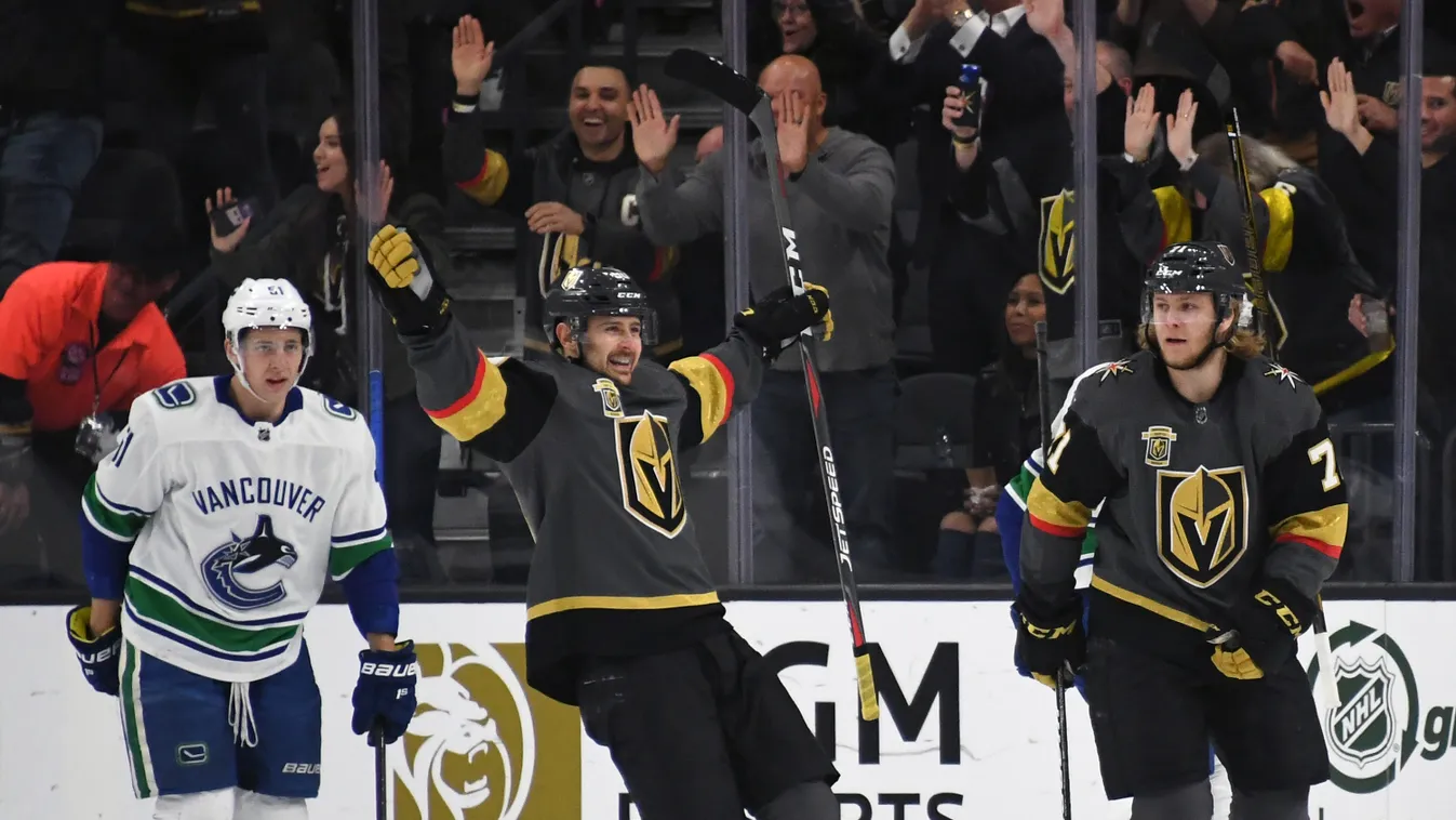 Vancouver Canucks v Vegas Golden Knights GettyImageRank2 People SPORT HORIZONTAL Full Length ICE HOCKEY Looking USA Sports Team Nevada Las Vegas Winter Sport COMMEMORATION Three People Photography National Hockey League Vancouver Canucks Round One Hockey 