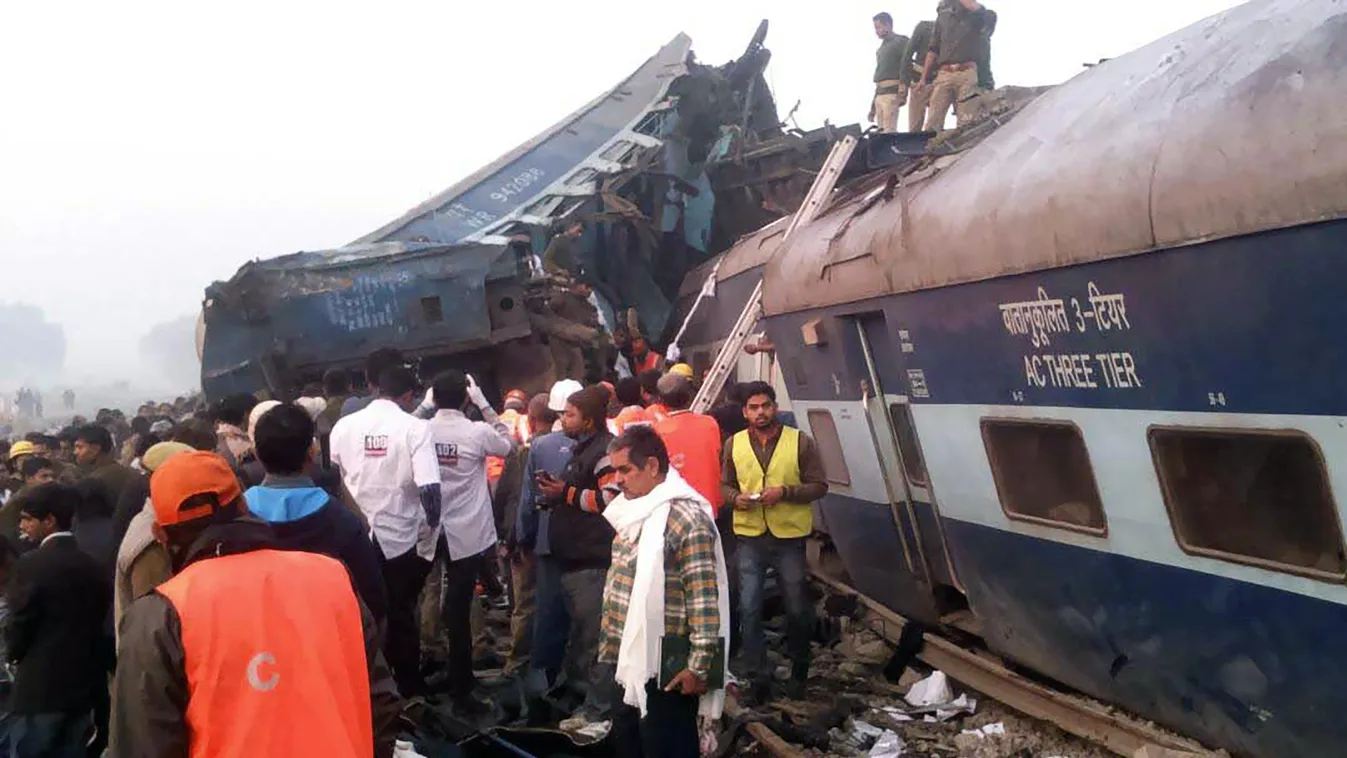 TOPSHOTS Horizontal ACCIDENT DE TRAIN ACCIDENT CATASTROPHES LIEU DE L'ACCIDENT TRAIN VOIE FERREE SAUVETEUR DEGATS DEGATS ACCIDENTS FOULE Indian rescue workers search for survivors in the wreckage of a train that derailed near Pukhrayan in Kanpur district 