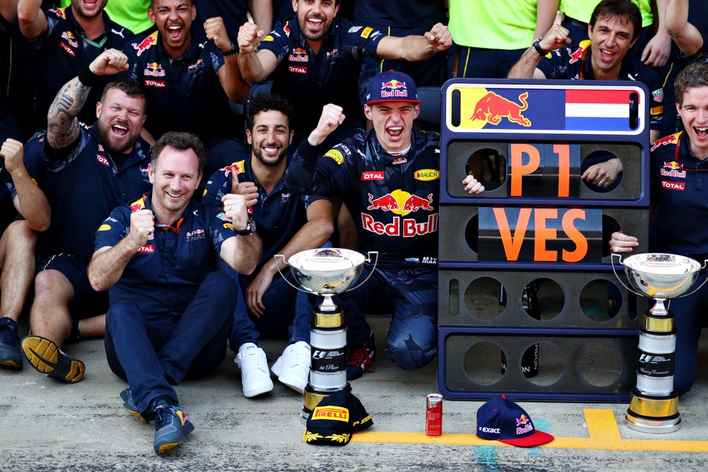 Spanish F1 Grand Prix MONTMELO, SPAIN - MAY 15: Max Verstappen of Netherlands and Red Bull Racing celebrates his first F1 win with Daniel Ricciardo of Australia and Red Bull Racing, Red Bull Racing Team Principal Christian Horner and the rest of the Red B