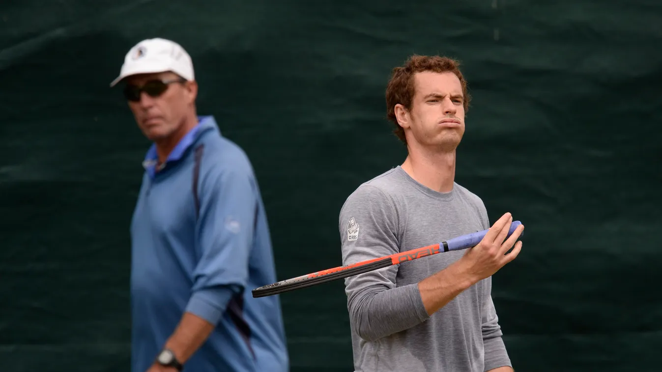 TENNIS WIMBLEDON TENNIS BALL TRAINING ATTITUDE HORIZONTAL Britain's Andy Murray (R) and his coach Ivan Lendl (L) attend a training session at the practice courts on day ten of the 2013 Wimbledon Championships tennis tournament at the All England Club in W