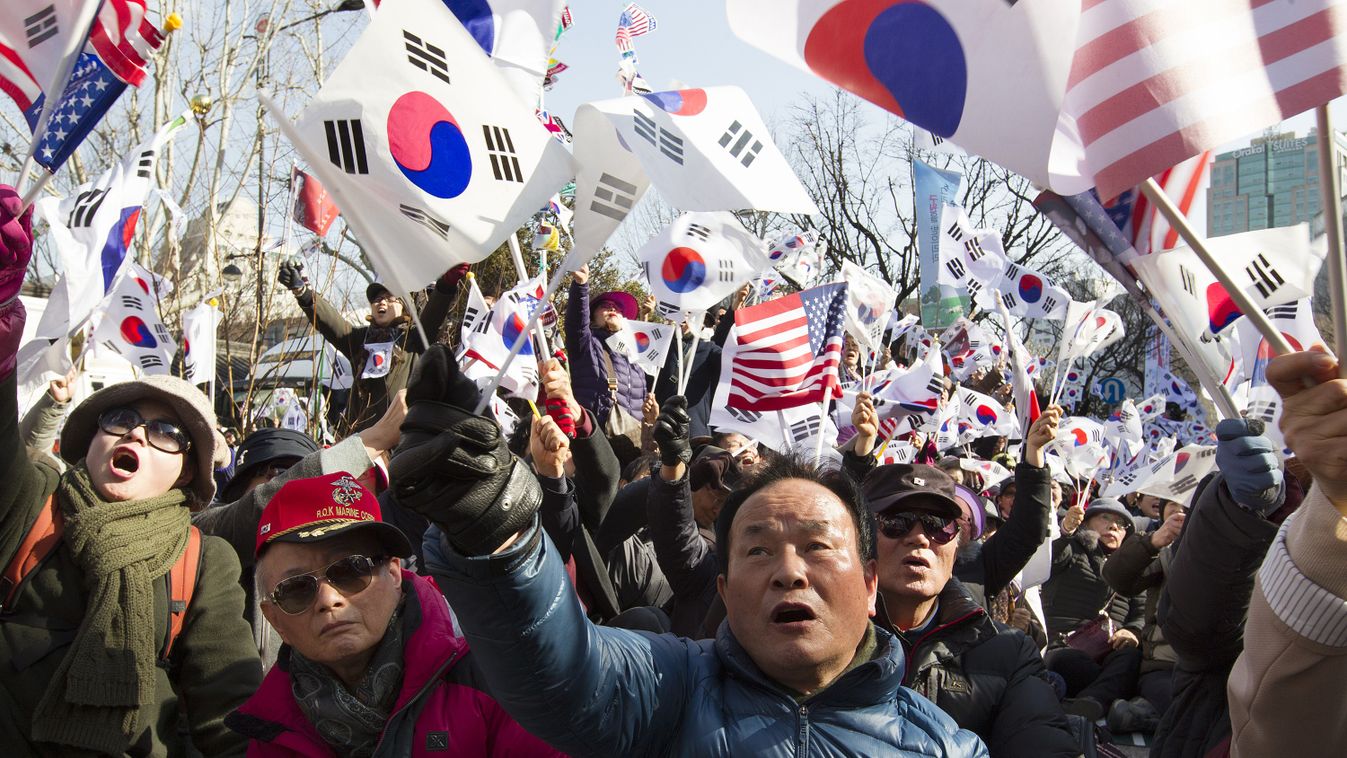 S.Korean court to reveal president’s fate on Friday TRIAL South Korea Seoul 2017 DEMONSTRATION South Korean RALLY Police officers People FLAG Supporters march VERDICT Security measures impeachment South Korean President banners posters POSTER South Korea’