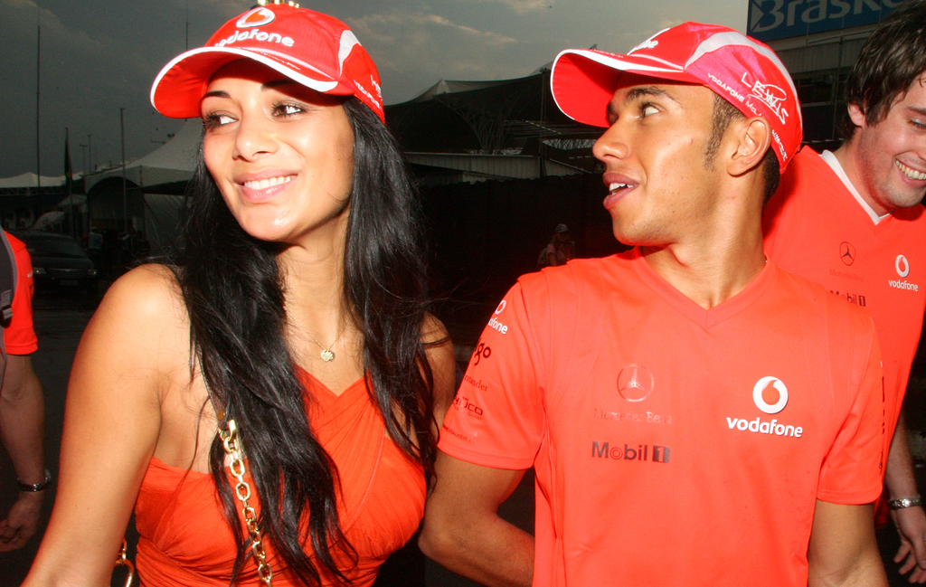Formula One Brazil - Scherzinger and Hamilton Motor_Racing SPO Sports COUPLE exterior female formula_1 group happy male SMILING HORIZONTAL Nicole galéria 