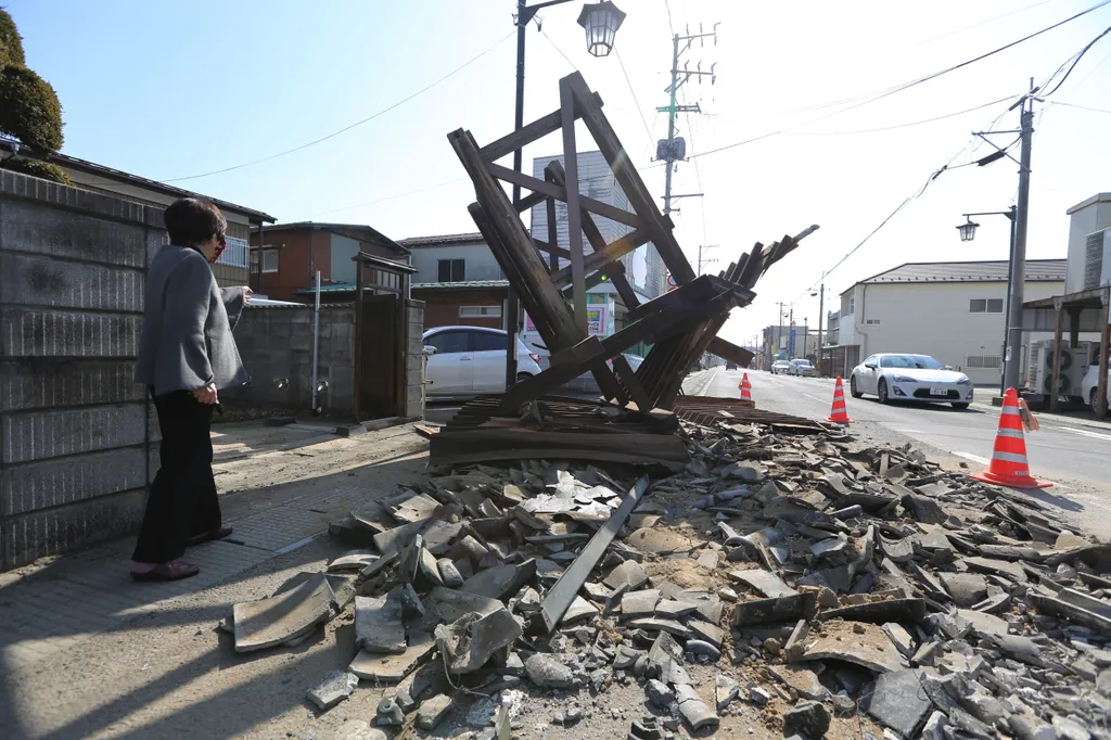 Strong earthquake hits Fukushima and Miyagi in Japan disaster DIS POL POLITICS TIDAL WAVE EARTHQUAKE 