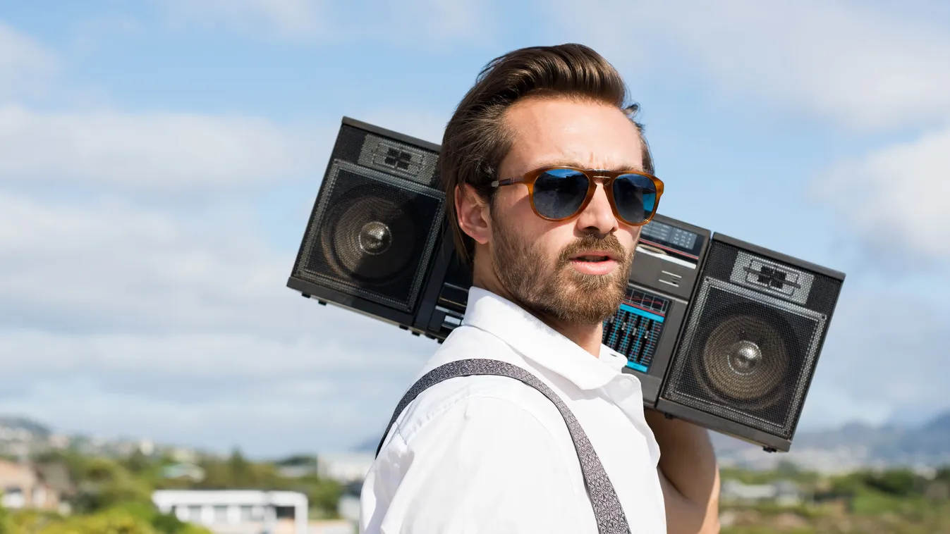 listening music radio guy man portrait hipster vintage retro holding listen sunglasses outdoor person people adult ear handsome beard sound serious old style nostalgia cool stereo pensive leisure 