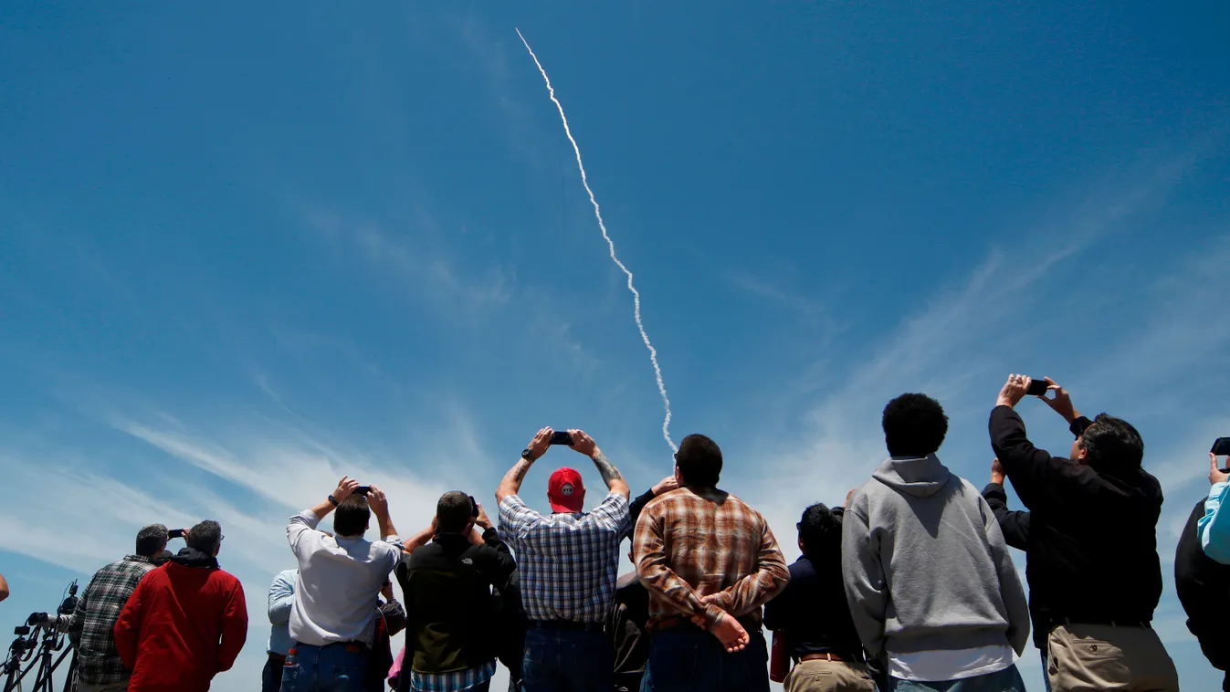 Horizontal People watch a ground based interceptor missle take off at Vandenberg Air Force base, California on May 30, 2017.
The US military said it had intercepted a mock-up of an intercontinental ballistic missile in a first-of-its-kind test that comes 