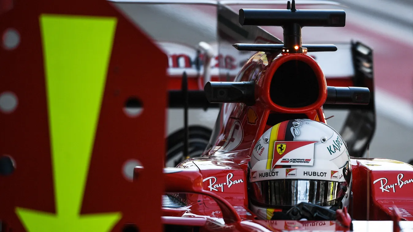 2017 Formula 1 VTB Russian Grand Prix. Second practice session race landscape HORIZONTAL car race formula 1 pit lane f1 russian grand prix 3086004 04/28/2017 Ferrari team driver Sebastian Vettel is in the pit lane prior to the second practice session at t