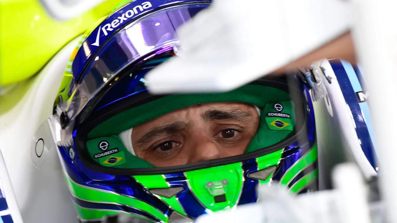 Horizontal Williams' Brazilian driver Felipe Massa sits in his car in the pits during the second practice session at the Autodromo Nazionale circuit in Monza on September 1, 2017 ahead of the Italian Formula One Grand Prix. / AFP PHOTO / MIGUEL MEDINA 