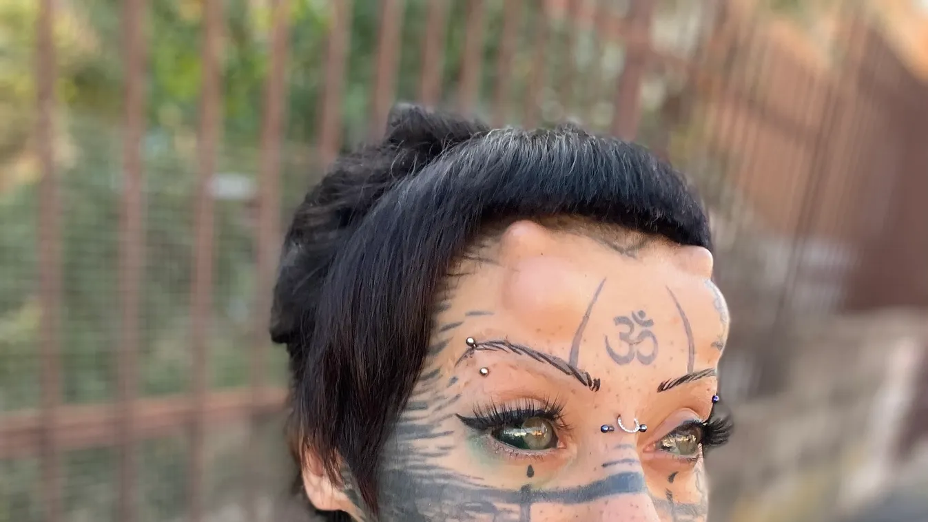 Cat-Woman Transitioner Black Tattoos Body modification Cat woman extreme piercings extreme tattoo facial piercings full body tattoos Rome ODDSHOT 