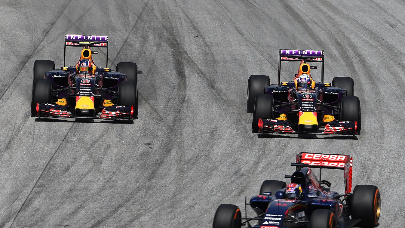 F1 Grand Prix of Malaysia KUALA LUMPUR, MALAYSIA - MARCH 29:  Daniel Ricciardo of Australia and Infiniti Red Bull Racing and Daniil Kvyat of Russia and Infiniti Red Bull Racing drive next to Max Verstappen of Netherlands and Scuderia Toro Rosso during the