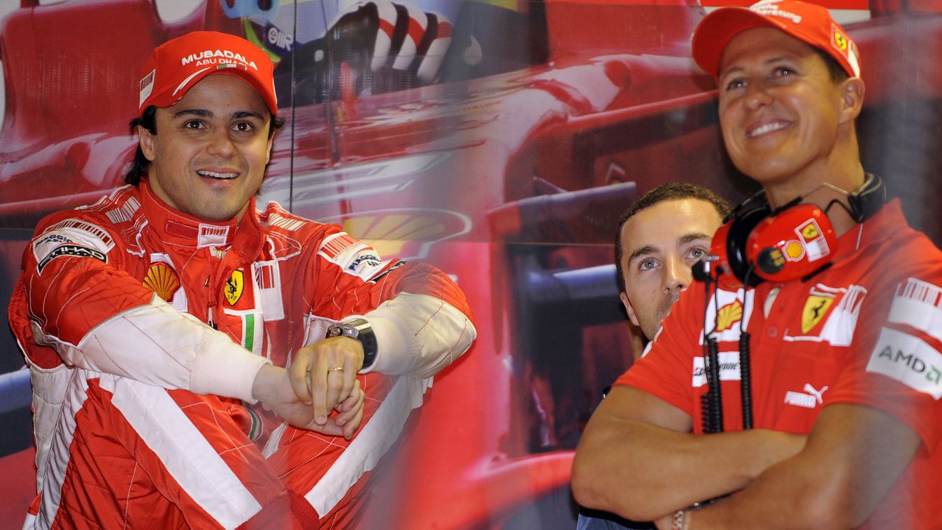 78146801 Horizontal Ferrari Brazilian's driver Felipe Massa (L) and seven times drivers champion and Ferrari team advisor Michael Schumacher (R) speak in the pits of the Monza racetrack on September 13, 2008 near Milan, during the third practice session o