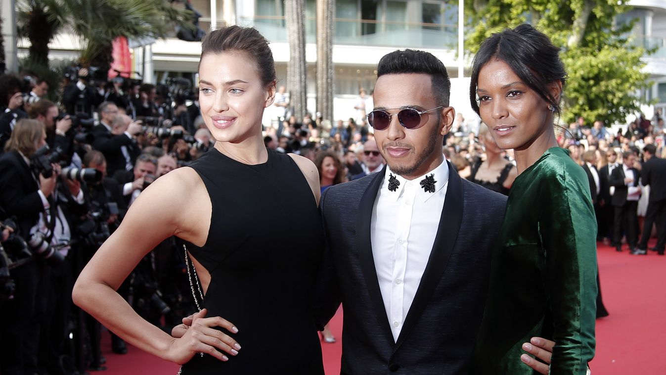 France Cannes La Fille Inconnue Red Carpet Unterhaltung Vergnügung Kino Ablenkung Animation STAR berühmte Persönlichkeit SQUARE FORMAT Model Adrian Lima, F1 driver Lewis Hamilton and model Liya Kebede pose for photographers upon arrival at the screening o
