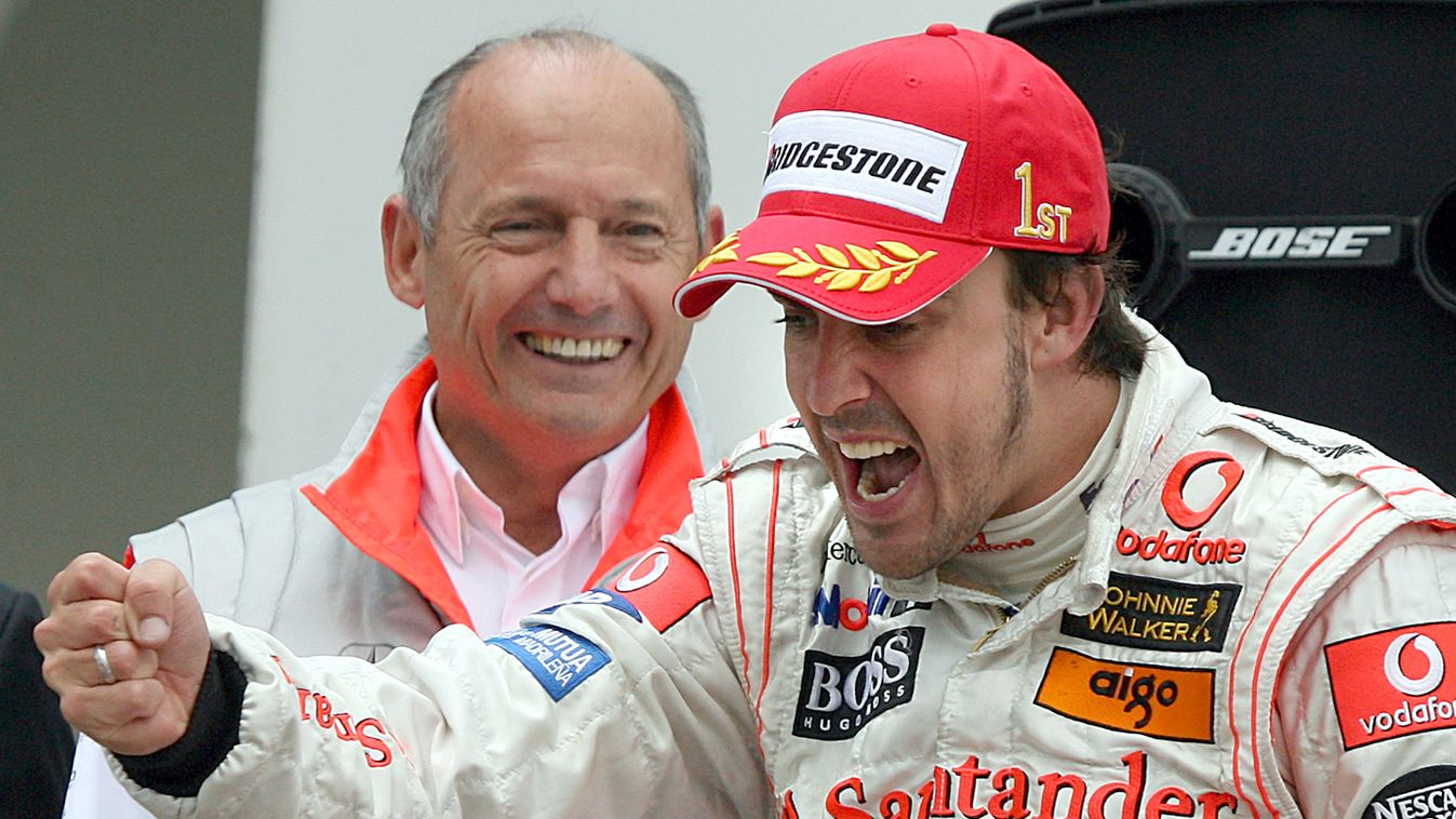 Formula One Nurburgring - Alonso wins Motor_Racing SPO Sports action F1 formula_1 GESTURE group male HORIZONTAL Spanish Formula One pilot Fernando Alonso of McLaren Mercedes celebrates his victory with team principal of McLaren Mercedes, Ron Dennis (L), a