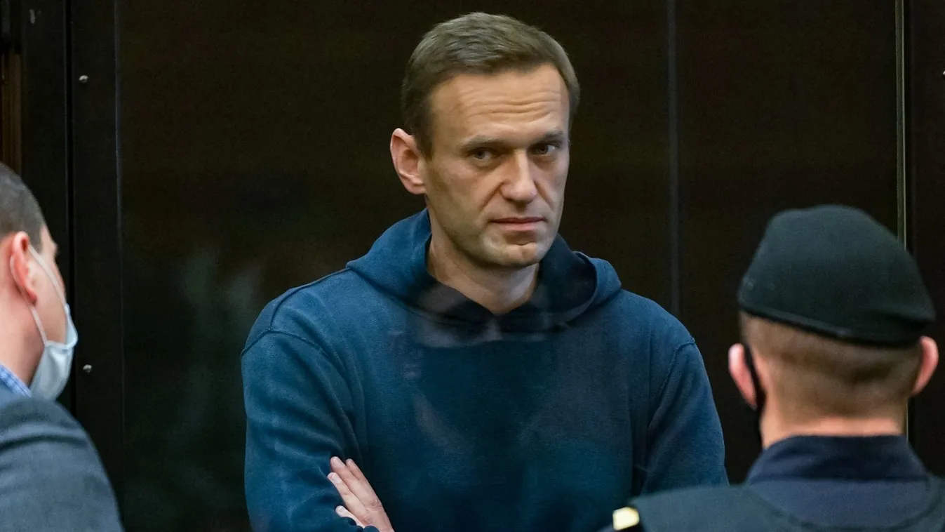 (FILES) Russian opposition leader Alexei Navalny, charged with violating the terms of a 2014 suspended sentence for embezzlement, stands inside a glass cell during a court hearing in Moscow on February 2, 2021. Russian opposition leader Alexei Navalny died on February 16, 2024 at the Arctic prison colony where he was serving a 19-year-term, Russia's federal penitentiary service said in a statement. (Photo by Handout / Moscow City Court press service / AFP) / RESTRICTED TO EDITORIAL USE - MANDATORY CREDIT "AFP PHOTO / Moscow City Court press service / handout" - NO MARKETING - NO ADVERTISING CAMPAIGNS - DISTRIBUTED AS A SERVICE TO CLIENTS
