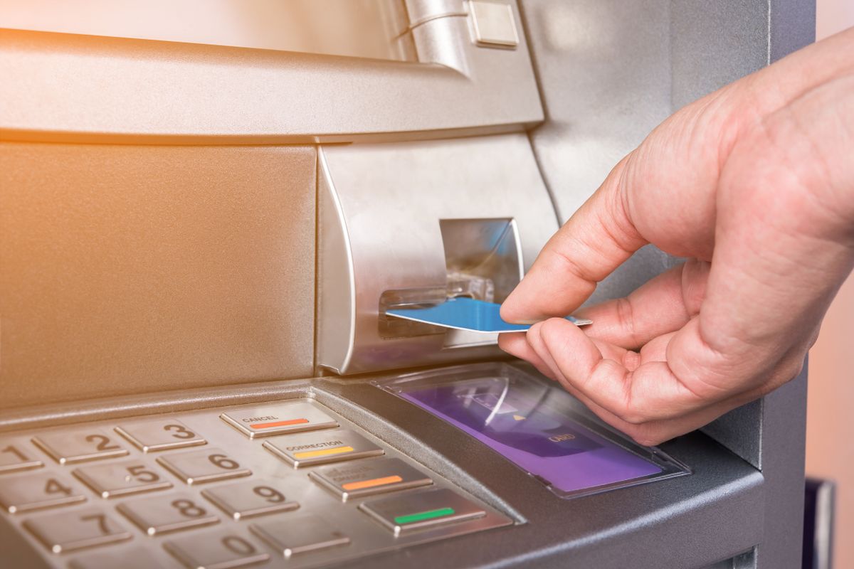 Hand,Inserting,Atm,Card,Into,Bank,Machine,To,Withdraw,Money, atm