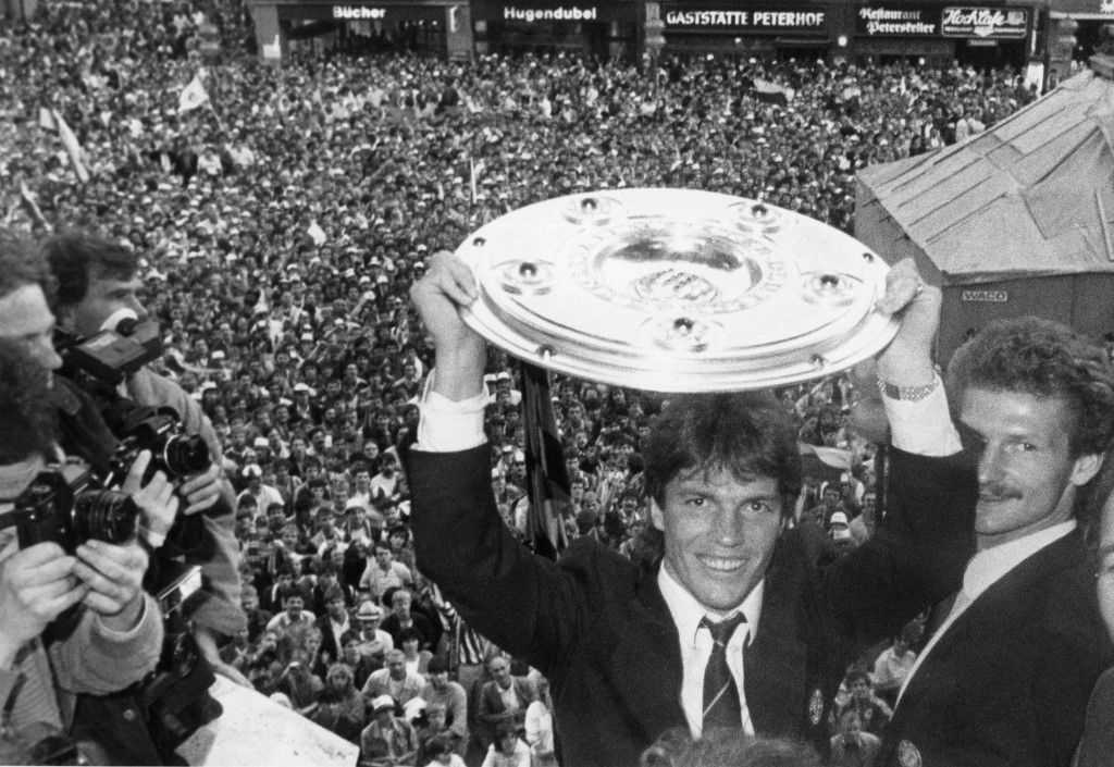 Lothar Matthäus cheers with the Cup