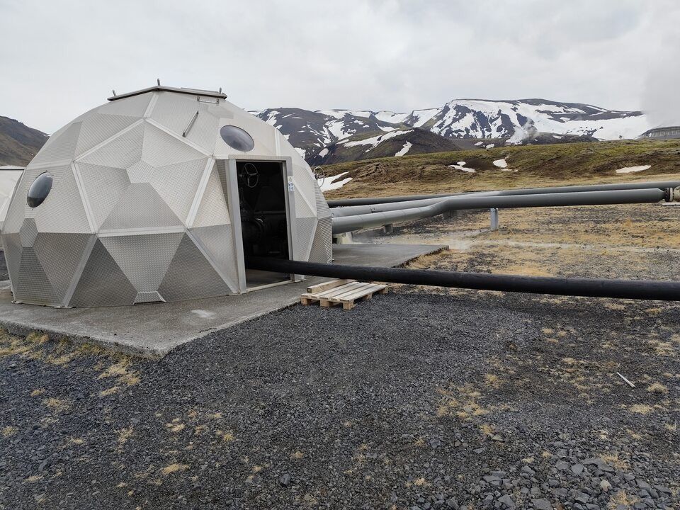 The yurt-like structures visible in the geothermal park play a role in bringing underground carbon dioxide extracted from the geothermal power and air capture plant, Carpex, Air Capture, Iceland