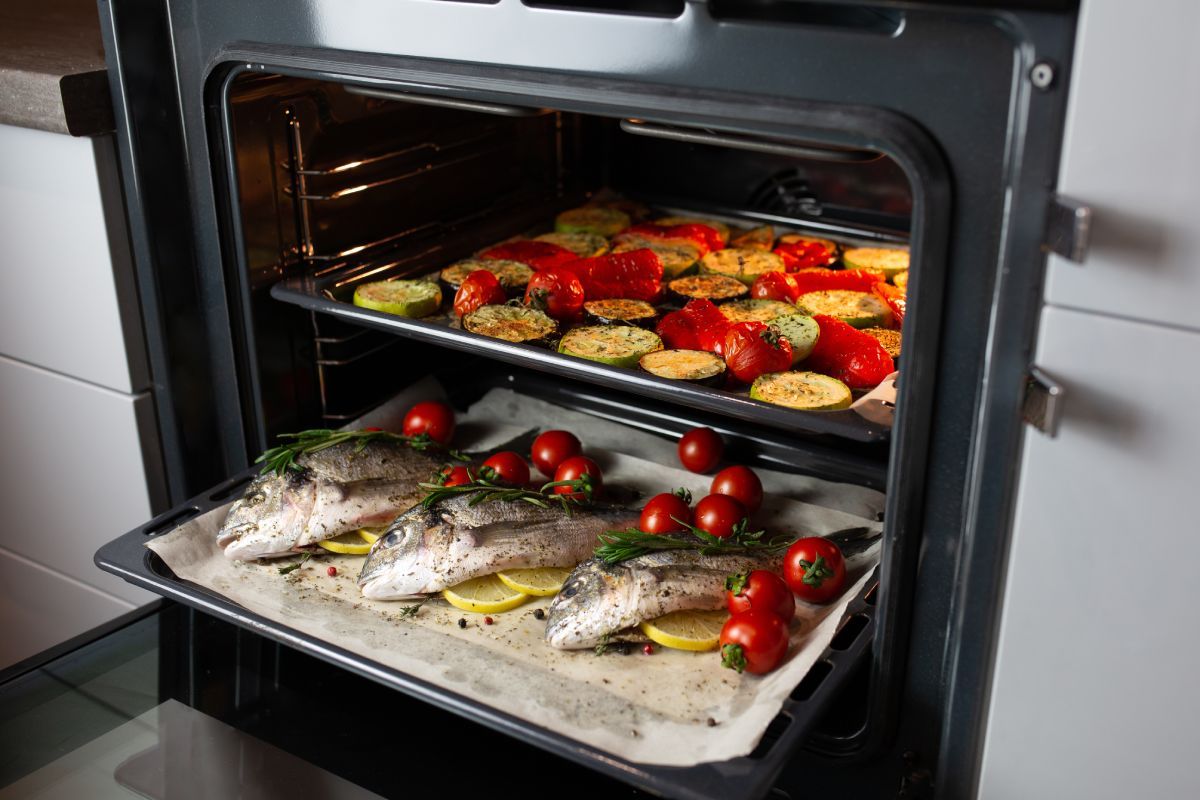 Cooking,Fish,In,The,Oven.cooking,Dorado,With,Cherry,Tomatoes,And