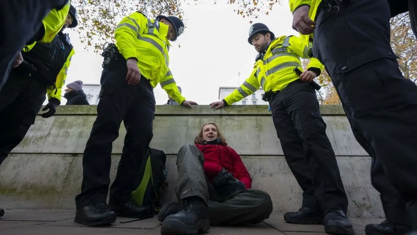 Protesters rally outside Scotland Yard, demanding release of detained environmental protesters in London