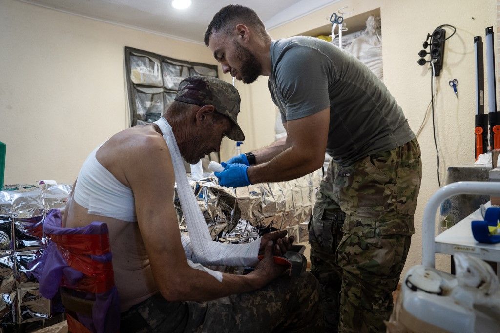 Ukrainian army medics treat wounded soldiers in stabilization point in Pokrovsk