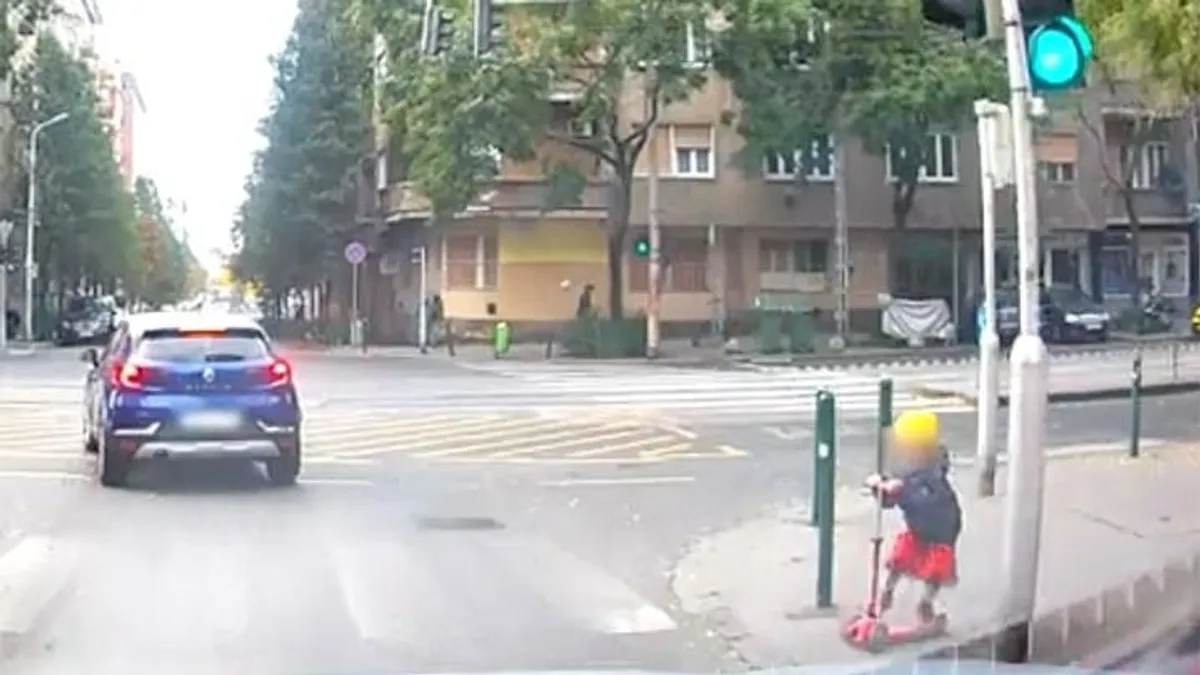 Szabadon engedték a rollerező kislányt Budán, vérfagyasztó videón, ahogy majdnem elgázolták