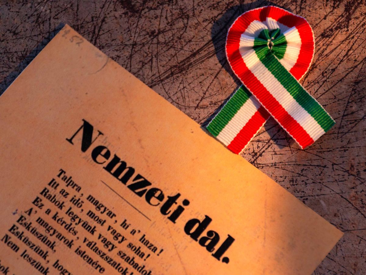 kokárda,  magyar kokárda, kokárda kitűző,  Nemzeti dal,  Budapest, Hungary - 06.04.2024 - Hungarian tricolor cockade and National song