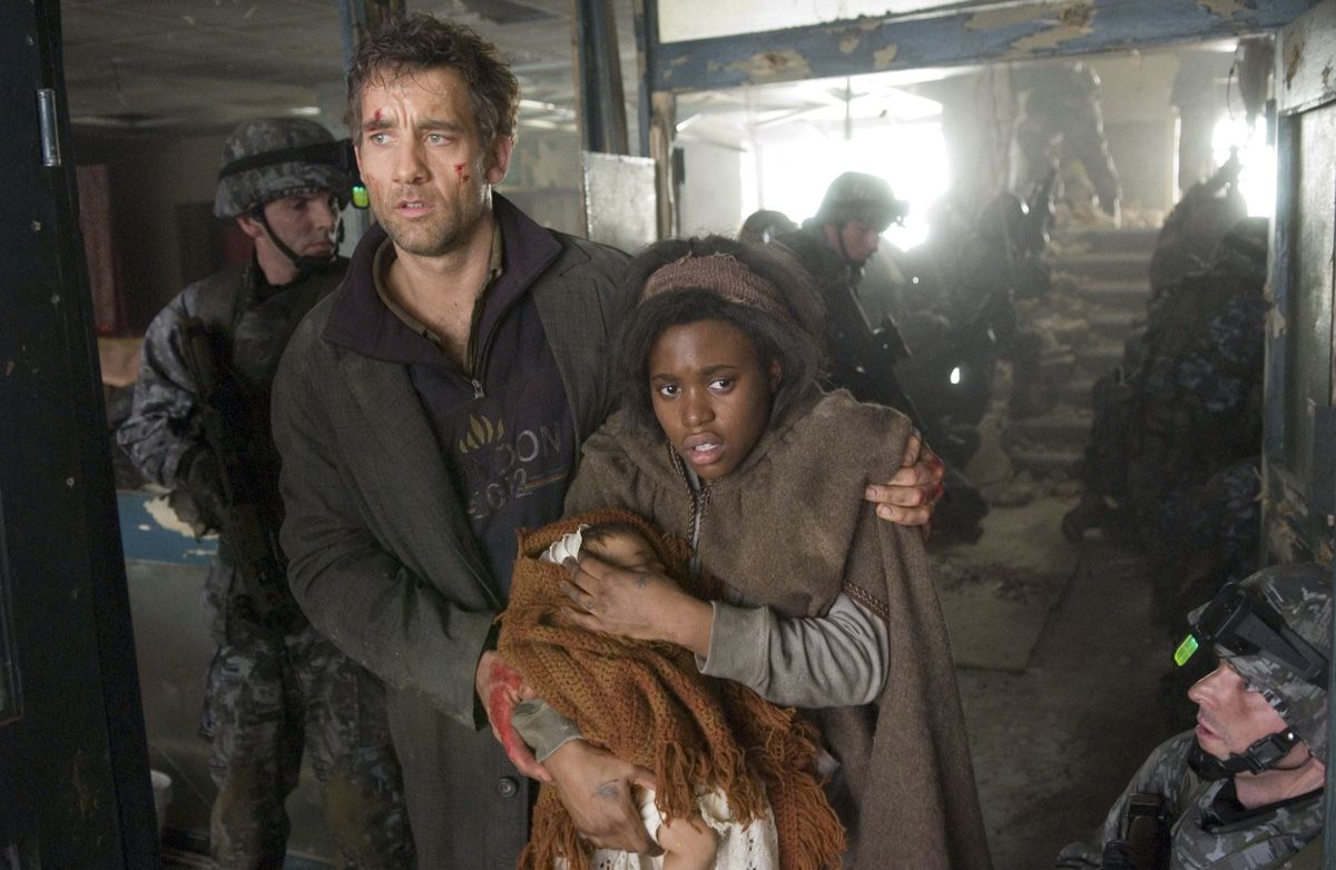 Les fils de l'homme  Children of Men   Year: 2006 - UK / USA  Clive Owen, Claire-Hope Ashitey   Director: Alfonso Cuarón (Photo by Archives du 7eme Art / Photo12 via AFP)