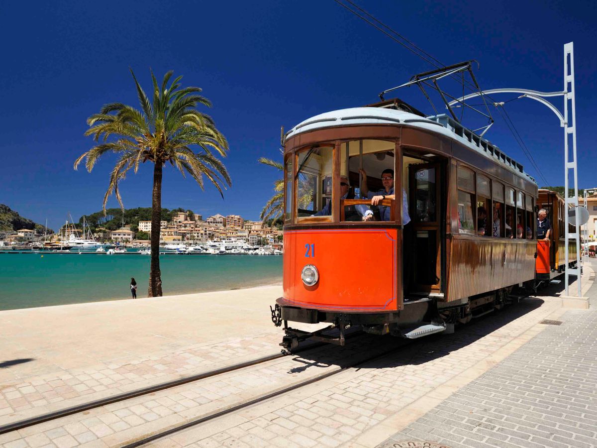 PuertoSollerbeachMallorca Spain, Balearic Islands, Mallorca, Puerto Soller (Port of Soller), tramway on the Promenade (Photo by SOBERKA Richard / hemis.fr / Hemis via AFP)