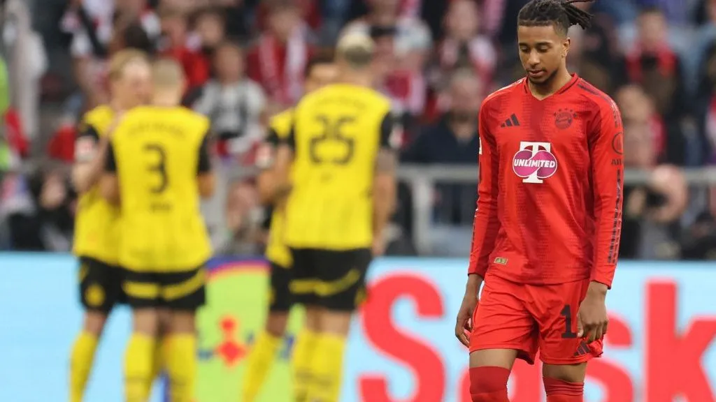 Bayern Munich's French midfielder #17 Michael Olise reacts during the German first division Bundesliga football match between Bayern Munich and Borussia Dortmund in Munich, southern Germany, on April 12, 2025. (Photo by Alexandra BEIER / AFP) / DFL REGULATIONS PROHIBIT ANY USE OF PHOTOGRAPHS AS IMAGE SEQUENCES AND/OR QUASI-VIDEO / The erroneous mention[s] appearing in the metadata of this photo by Alexandra BEIER has been modified in AFP systems in the following manner: [Bayern Munich's French midfielder #17 Michael Olise] instead of [Dortmund's English midfielder #17 Carney Chukwuemeka]. Please immediately remove the erroneous mention[s] from all your online services and delete it (them) from your servers. If you have been authorized by AFP to distribute it (them) to third parties, please ensure that the same actions are carried out by them. Failure to promptly comply with these instructions will entail liability on your part for any continued or post notification usage. Therefore we thank you very much for all your attention and prompt action. We are sorry for the inconvenience this notification may cause and remain at your disposal for any further information you may require.
