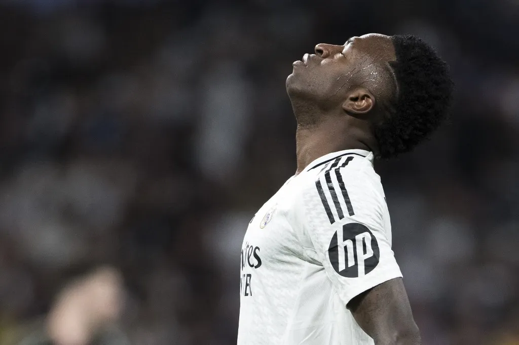Vinicius Jr of Real Madrid reacts to a missed opportunity during the UEFA Champions League 2024/25 Quarter Final second leg match between Real Madrid and Arsenal at Santiago Bernabeu Stadium in Madrid, Spain, on April 16. (Photo by Guillermo Martinez) (Photo by Guillermo Martinez / NurPhoto / NurPhoto via AFP)