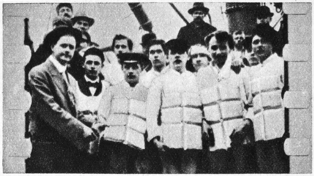 The loss of SS Titanic, 14 April 1912: Members of the ship's crew in their life jackets.  Operated by the White Star Line, SS Titanic struck an iceberg in thick fog off Newfoundland. She was the largest and most luxurious ocean liner of her time, and thou