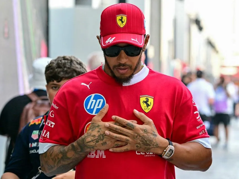 Ferrari's British driver Lewis Hamilton arrives to the paddock ahead of the 2025 Saudi Arabia Formula One Grand Prix at the Jeddah Corniche Circuit on April 20, 2025. (Photo by Giuseppe CACACE / AFP)